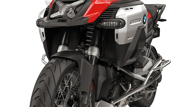 Robust hand-protector bar/highly integrated additional headlight